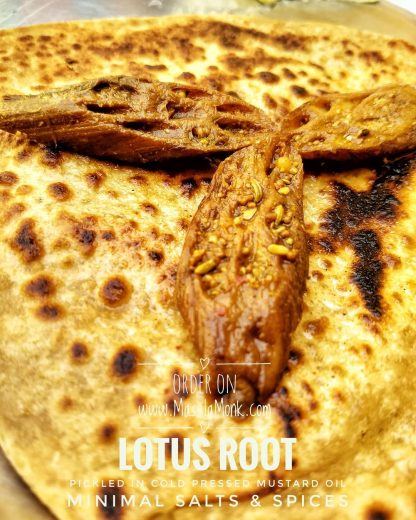 Sindhi Bhee or Lotus Root pickle from Himalayas on a parantha