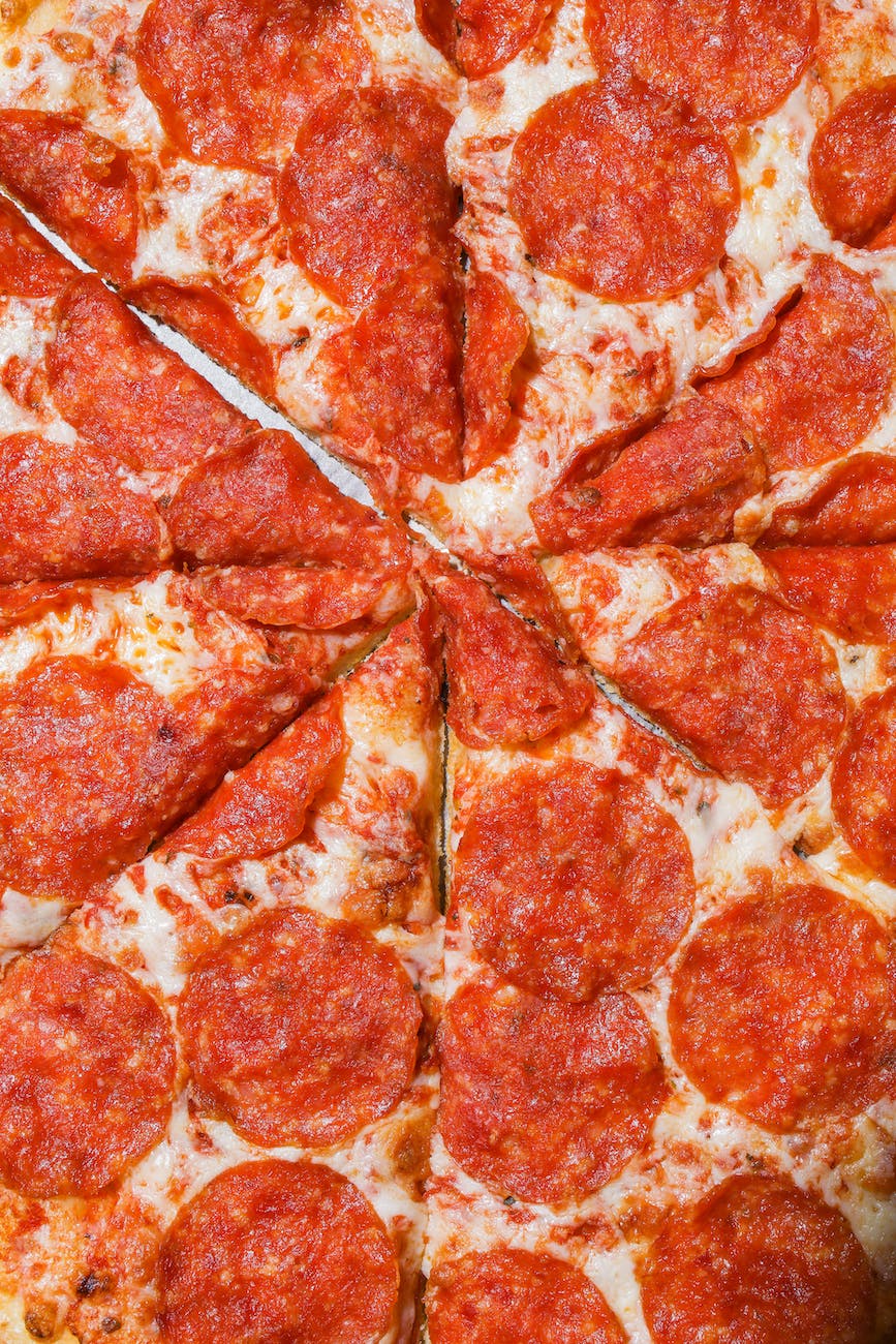 sliced pepperoni pizza in close up view