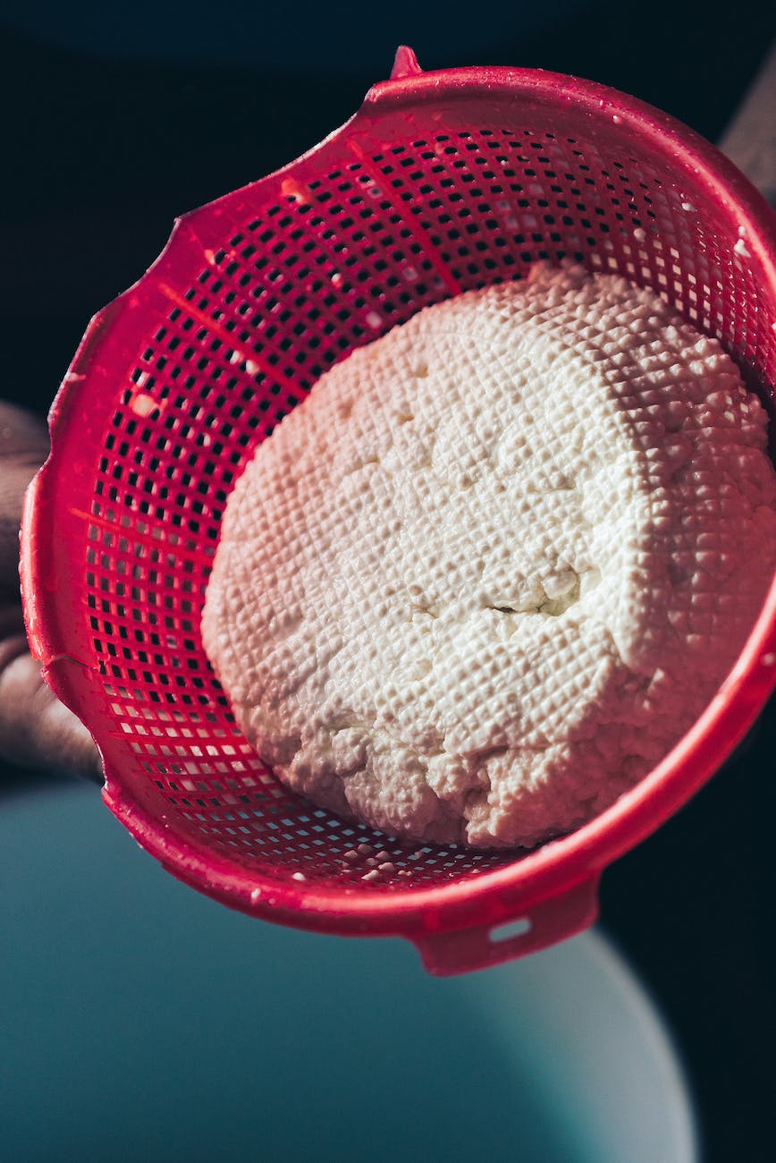 close up of cottage cheese in a sieve